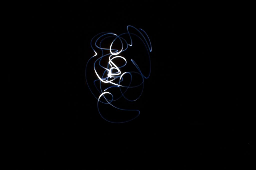 Dark background with light tracers